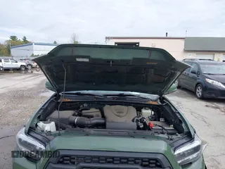 2021 Toyota Tacoma SR with VIN 3TMCZ5AN5MM380286, listed as a IAAI auction lot 42165523 with 58,965 mi miles and . Bid and sale history available at DreamBid. Image 10.