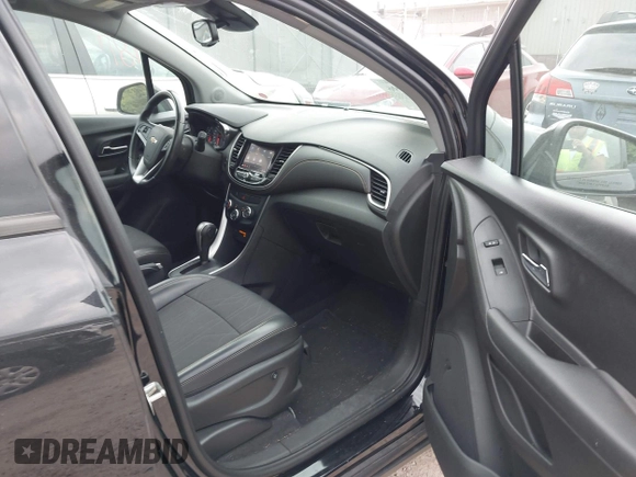 2020 Chevrolet Trax LT with VIN 3GNCJLSB8LL293414, listed as a IAAI auction lot 42714496 with 34,038 mi miles and . Bid and sale history available at DreamBid. Image 5.