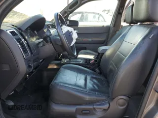 2012 Ford Escape Limited z VIN 1FMCU0E7XCKB19962, wystawiony jako Copart lot #49287765 z przebiegiem 132 747 mil mil oraz Szkoda całkowita • Salvage title. Historia ofert i sprzedaży dostępna na DreamBid. Obrazek 7.