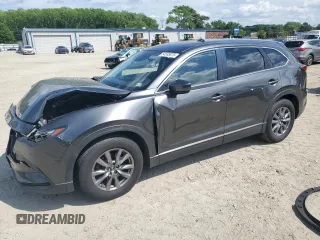 2018 Mazda CX-9 Sport z VIN JM3TCBBY8J0212592, wystawiony jako Copart lot #54555875 z przebiegiem 124 684 mil mil oraz Szkoda całkowita • Salvage title. Historia ofert i sprzedaży dostępna na DreamBid. Obrazek 1.