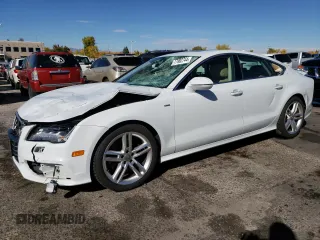 2014 Audi A7 Prestige with VIN WAU2MAFC7EN035274, listed as a Copart auction lot 77902744 with 73,992 mi miles and Salvage title. Bid and sale history available at DreamBid. Image 1.