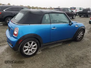 2011 MINI Convertible S с VIN WMWZP3C52BTX82943, выставлен на аукционе Copart как лот 81586044 с пробегом 145 543 миль миль и Списание • Salvage title. История ставок и продаж доступна на DreamBid. Изображение 3.