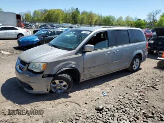 2013 Dodge Grand Caravan SXT with VIN 2C4RDGCG0DR582254, listed as a Copart auction lot 54735205 with 126,071 mi miles and Salvage Title. Bid and sale history available at DreamBid. Image 1.