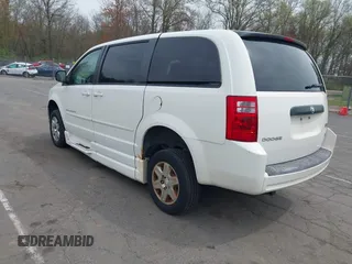 2010 Dodge Grand Caravan SE with VIN 2D4RN4DE0AR296590, listed as a IAAI auction lot 42133404 with 108,604 mi miles and . Bid and sale history available at DreamBid. Image 3.