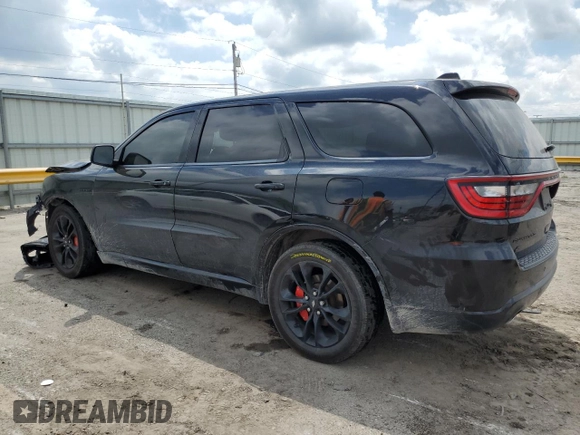 2020 Dodge Durango R/T with VIN 1C4SDJCT9LC212830, listed as a Copart auction lot 56677395 with 95,958 mi miles and Salvage title. Bid and sale history available at DreamBid. Image 2.