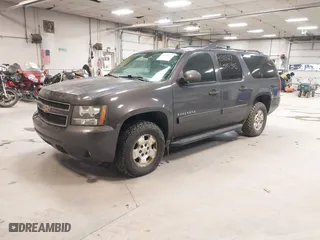 2010 Chevrolet Suburban LT with VIN 1GNUKJE36AR139025, listed as a IAAI auction lot 41311327 with 201,955 mi miles. Bid and sale history available at carsss.com. Image 2.