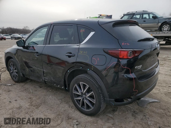 2018 Mazda CX-5 Touring with VIN JM3KFBCM2J0427786, listed as a Copart auction lot 45539345 with 62,989 mi miles and Salvage Title. Bid and sale history available at carsss.com. Image 2.