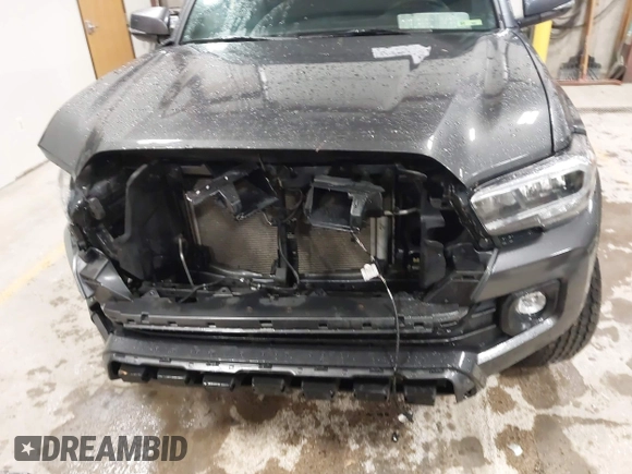2021 Toyota Tacoma SR z VIN 3TMCZ5AN2MM444249, wystawiony jako IAAI lot #41942146 z przebiegiem 59 429 mil mil oraz . Historia ofert i sprzedaży dostępna na DreamBid. Obrazek 13.