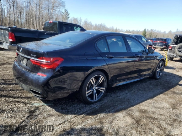 2017 BMW 7 Series 750i xDrive with VIN WBA7B0C55HG527032, listed as a Copart auction lot 52026415 with 67,722 mi miles and Clean title. Bid and sale history available at DreamBid. Image 3.