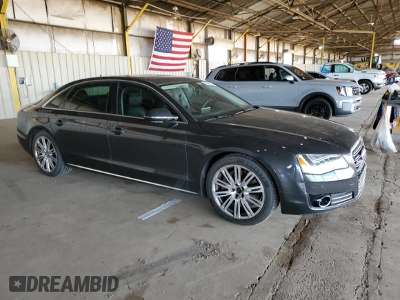 2011 Audi A8 with VIN WAURVAFD4BN004628, listed as a Copart auction lot 52244125 with 182,631 mi miles and Clean title. Bid and sale history available at DreamBid. Image 4.