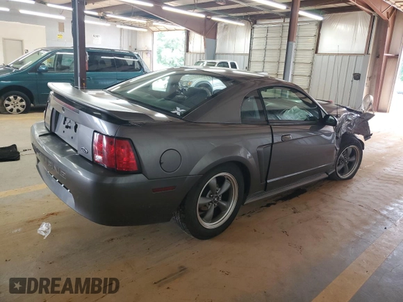 2003 Ford Mustang Standard with VIN 1FAFP40473F313652, listed as a Copart auction lot 57882105 with Not provided miles and Salvage title. Bid and sale history available at DreamBid. Image 3.
