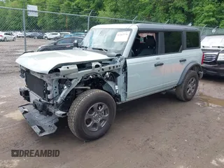 2023 Ford Bronco with VIN 1FMDE5BH5PLC15428, listed as a IAAI auction lot 42263776 with 11,556 mi miles and . Bid and sale history available at DreamBid. Image 2.
