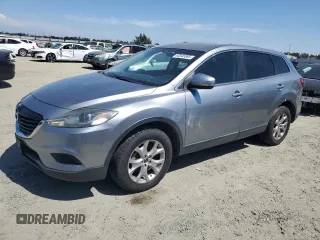 2015 Mazda CX-9 Sport with VIN JM3TB2BV1F0451160, listed as a Copart auction lot 63345365 with 233,594 mi miles and Clean title. Bid and sale history available at DreamBid. Image 1.