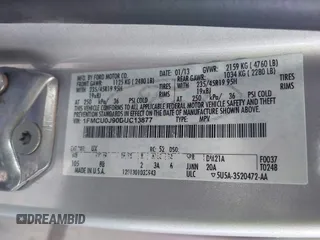 2013 Ford Escape Titanium with VIN 1FMCU0J90DUC13877, listed as a IAAI auction lot 42370172 with 119,745 mi miles and . Bid and sale history available at DreamBid. Image 9.