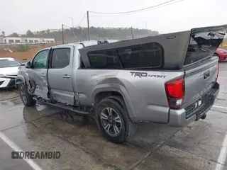 2018 Toyota Tacoma SR5 with VIN 3TMBZ5DN0JM012259, listed as a IAAI auction lot 41709709 with Not provided miles and . Bid and sale history available at DreamBid. Image 3.
