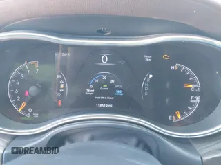 2015 Jeep Grand Cherokee Overland with VIN 1C4RJECG3FC635327, listed as a IAAI auction lot 41910559 with 118,519 mi miles and . Bid and sale history available at DreamBid. Image 7.