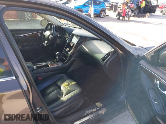 2014 Infiniti Q50 with VIN JN1BV7AP8EM683390, listed as a IAAI auction lot 40941679 with 154,408 mi miles. Bid and sale history available at carsss.com. Image 5.