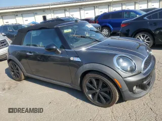 2014 MINI Convertible S с VIN WMWZP3C52ET706661, выставлен на аукционе Copart как лот 70040934 с пробегом 65 484 миль миль и Списание • Salvage title. История ставок и продаж доступна на DreamBid. Изображение 4.