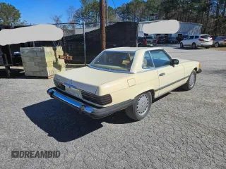1987 Mercedes-Benz 560 SL with VIN WDBBA48D5HA061899, listed as a Copart auction lot 45910515 with 68,293 mi miles and Clean Title. Bid and sale history available at DreamBid. Image 4.