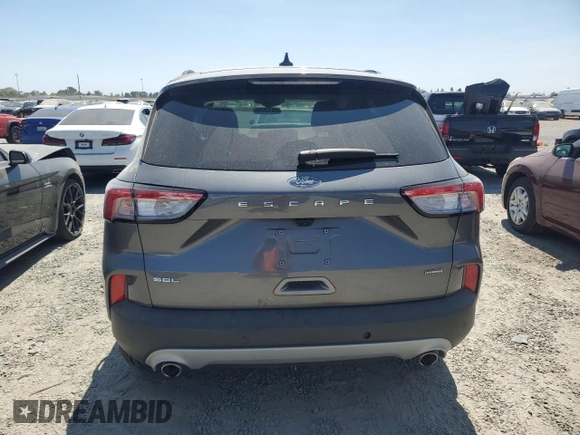 2021 Ford Escape SEL Hybrid with VIN 1FMCU0CZ4MUB20681, listed as a Copart auction lot 68497004 with 15,279 mi miles and Salvage title. Bid and sale history available at DreamBid. Image 6.