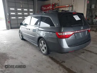 2011 Honda Odyssey Touring с VIN 5FNRL5H90BB025855, выставлен на аукционе IAAI как лот 42104979 с пробегом 165 010 миль миль и . История ставок и продаж доступна на DreamBid. Изображение 3.