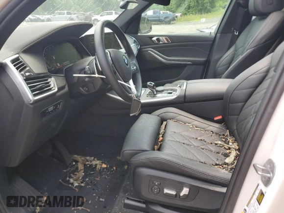 2023 BMW X5 xDrive40i with VIN 5UXCR6C03P9P75351, listed as a Copart auction lot 61465655 with 24,883 mi miles and Salvage title. Bid and sale history available at DreamBid. Image 7.