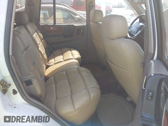 1994 Jeep Grand Cherokee Limited with VIN 1J4GZ78Y2RC344121, listed as a IAAI auction lot 42489350 with 219,186 mi miles and . Bid and sale history available at DreamBid. Image 8.