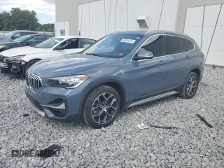 2021 BMW X1 sDrive28i z VIN WBXJG7C07M5U08432, wystawiony jako Copart lot #55559475 z przebiegiem 56 813 mil mil oraz Szkody całkowita. Historia ofert i sprzedaży dostępna na DreamBid. Obrazek 1.