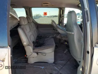 1999 Plymouth Voyager Grand SE z VIN 1P4GP44G1XB579504, wystawiony jako Copart lot #50064475 z przebiegiem Nie podano mil oraz Nie do naprawy. Historia ofert i sprzedaży dostępna na DreamBid. Obrazek 12.