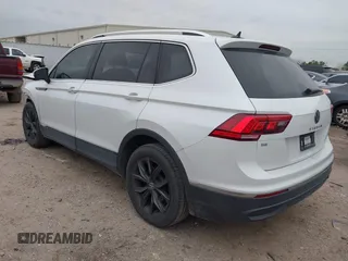 2023 Volkswagen Tiguan SE with VIN 3VVNB7AX8PM099759, listed as a IAAI auction lot 41340885 with 28,562 mi miles and . Bid and sale history available at DreamBid. Image 3.