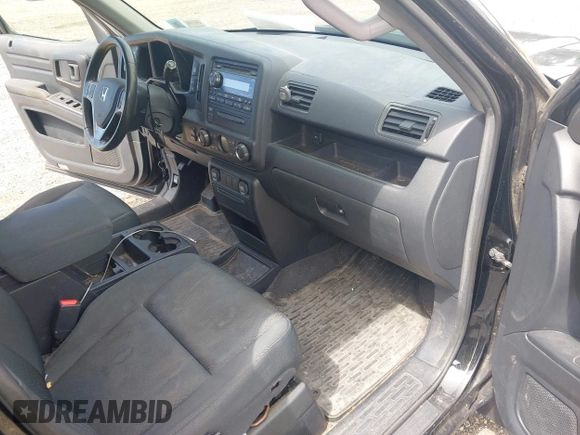 2014 Honda Ridgeline Sport with VIN 5FPYK1F71EB003710, listed as a IAAI auction lot 42777931 with 126,755 mi miles and . Bid and sale history available at DreamBid. Image 5.