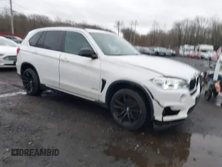 2015 BMW X5 xDrive35i with VIN 5UXKR0C57F0P11398, listed as a IAAI auction lot 41070786 with 114,785 mi miles. Bid and sale history available at carsss.com. Image 1.