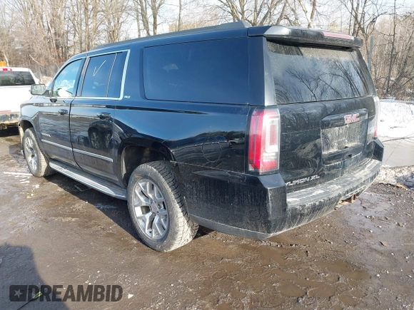 2015 GMC Yukon XL SLT with VIN 1GKS2HKC9FR159164, listed as a IAAI auction lot 41708822 with 136,730 mi miles. Bid and sale history available at carsss.com. Image 3.