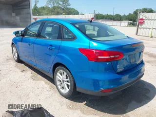 2016 Ford Focus SE with VIN 1FADP3F26GL350240, listed as a IAAI auction lot 41997300 with 84,871 mi miles. Bid and sale history available at carsss.com. Image 3.