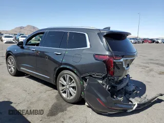2020 Cadillac XT6 FWD Premium Luxury z VIN 1GYKPCRS9LZ126510, wystawiony jako Copart lot #58240585 z przebiegiem 57 156 mil mil oraz Szkoda całkowita • Salvage title. Historia ofert i sprzedaży dostępna na DreamBid. Obrazek 2.