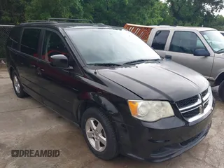 2013 Dodge Grand Caravan SXT with VIN 2C4RDGCG0DR552784, listed as a IAAI auction lot 42116395 with 96,917 mi miles and . Bid and sale history available at DreamBid. Image 1.