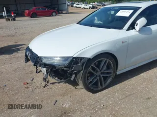 2016 Audi A7 Premium Plus with VIN WAUWGAFC2GN021696, listed as a IAAI auction lot 42595234 with 112,464 mi miles and . Bid and sale history available at DreamBid. Image 17.