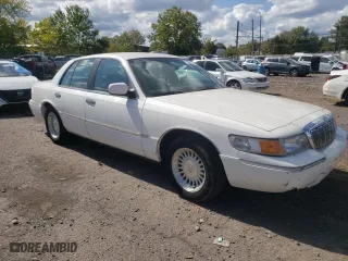 1998 Mercury Grand Marquis LS with VIN 2MEFM75WXWX642156, listed as a Copart auction lot 71282224 with 104,543 mi miles and Clean Title. Bid and sale history available at carsss.com. Image 4.