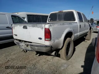 2002 Ford F-250 XL with VIN 1FTNW20F12EA44390, listed as a Copart auction lot 83888084 with 285,250 mi miles and Salvage Title. Bid and sale history available at DreamBid. Image 3.