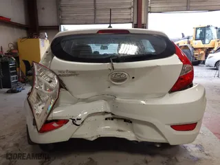 2013 Hyundai Accent GL with VIN KMHCT5AE6DU122559, listed as a IAAI auction lot 41800714 with 129,582 mi miles. Bid and sale history available at carsss.com. Image 16.