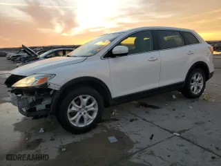2012 Mazda CX-9 Touring with VIN JM3TB2CA1C0334458, listed as a Copart auction lot 88581205 with 215,257 mi miles and Salvage Title. Bid and sale history available at carsss.com. Image 1.