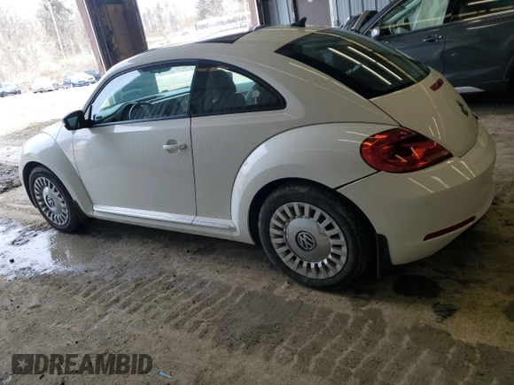 2014 Volkswagen Beetle 2.5L w/Sun with VIN 3VWJP7AT1EM612064, listed as a Copart auction lot 48005055 with 62,290 mi miles and Salvage Title. Bid and sale history available at DreamBid. Image 2.