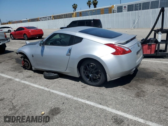 2014 Nissan 370Z Nismo with VIN JN1AZ4EH8EM633218, listed as a Copart auction lot 57296165 with Not provided miles and Salvage title. Bid and sale history available at DreamBid. Image 2.