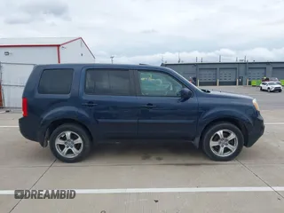 2012 Honda Pilot EX-L with VIN 5FNYF4H61CB043074, listed as a IAAI auction lot 42173097 with 234,192 mi miles. Bid and sale history available at carsss.com. Image 13.