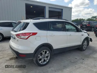 2013 Ford Escape SEL with VIN 1FMCU9H94DUA83824, listed as a Copart auction lot 59198775 with 77,120 mi miles and Salvage title. Bid and sale history available at DreamBid. Image 3.