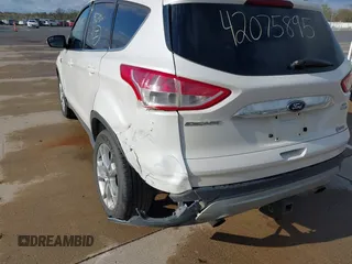 2013 Ford Escape SEL with VIN 1FMCU9H94DUB29989, listed as a IAAI auction lot 42075895 with 147,242 mi miles and . Bid and sale history available at DreamBid. Image 6.