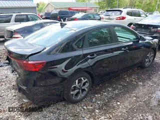 2021 Kia Forte LXS with VIN 3KPF24AD6ME307117, listed as a IAAI auction lot 42204377 with 52,364 mi miles and . Bid and sale history available at DreamBid. Image 4.