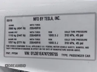 2019 Tesla Model 3 Mid Range z VIN 5YJ3E1EA7KF299755, wystawiony jako IAAI lot #42354352 z przebiegiem Nie podano mil oraz . Historia ofert i sprzedaży dostępna na DreamBid. Obrazek 8.