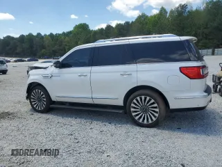 2019 Lincoln Navigator Reserve z VIN 5LMJJ2LT9KEL19544, wystawiony jako Copart lot #52240315 z przebiegiem 74 144 mil mil oraz Szkody całkowita. Historia ofert i sprzedaży dostępna na DreamBid. Obrazek 2.