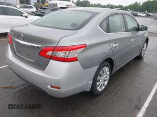 2014 Nissan Sentra S with VIN 3N1AB7AP2EL607775, listed as a IAAI auction lot 42127174 with 163,464 mi miles and . Bid and sale history available at DreamBid. Image 4.